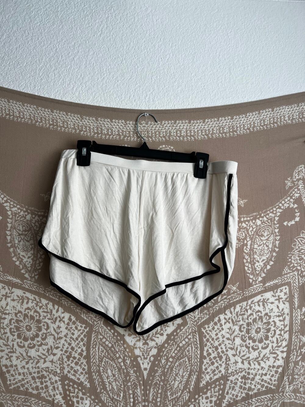 Naadam Cream Retro Dolphin-Hem Lounge Shorts with Black Trim